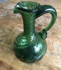 GREEN FOOTED HAND BLOWN SWIRLED GLASS VASE/PITCHER WITH HANDLE 7” TALL