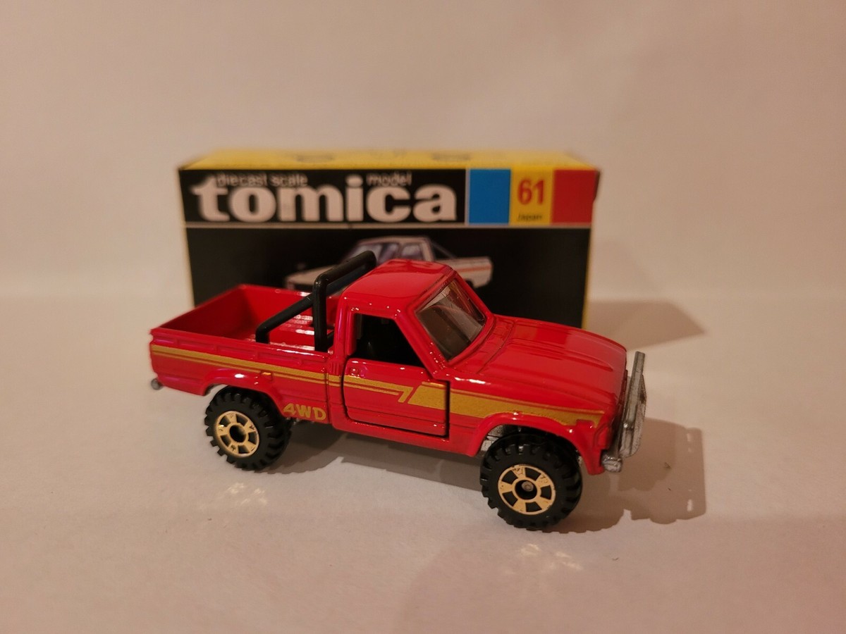 ラスト１点！TOYOTA HILUX 赤 ミニカー Amazon.com: Matchbox Toyota Hilux Pickup, [red] 13/100