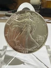 1987 AMERICAN SILVER EAGLE 1 Oz .999 Fine Silver! Comes withPlastic holder!