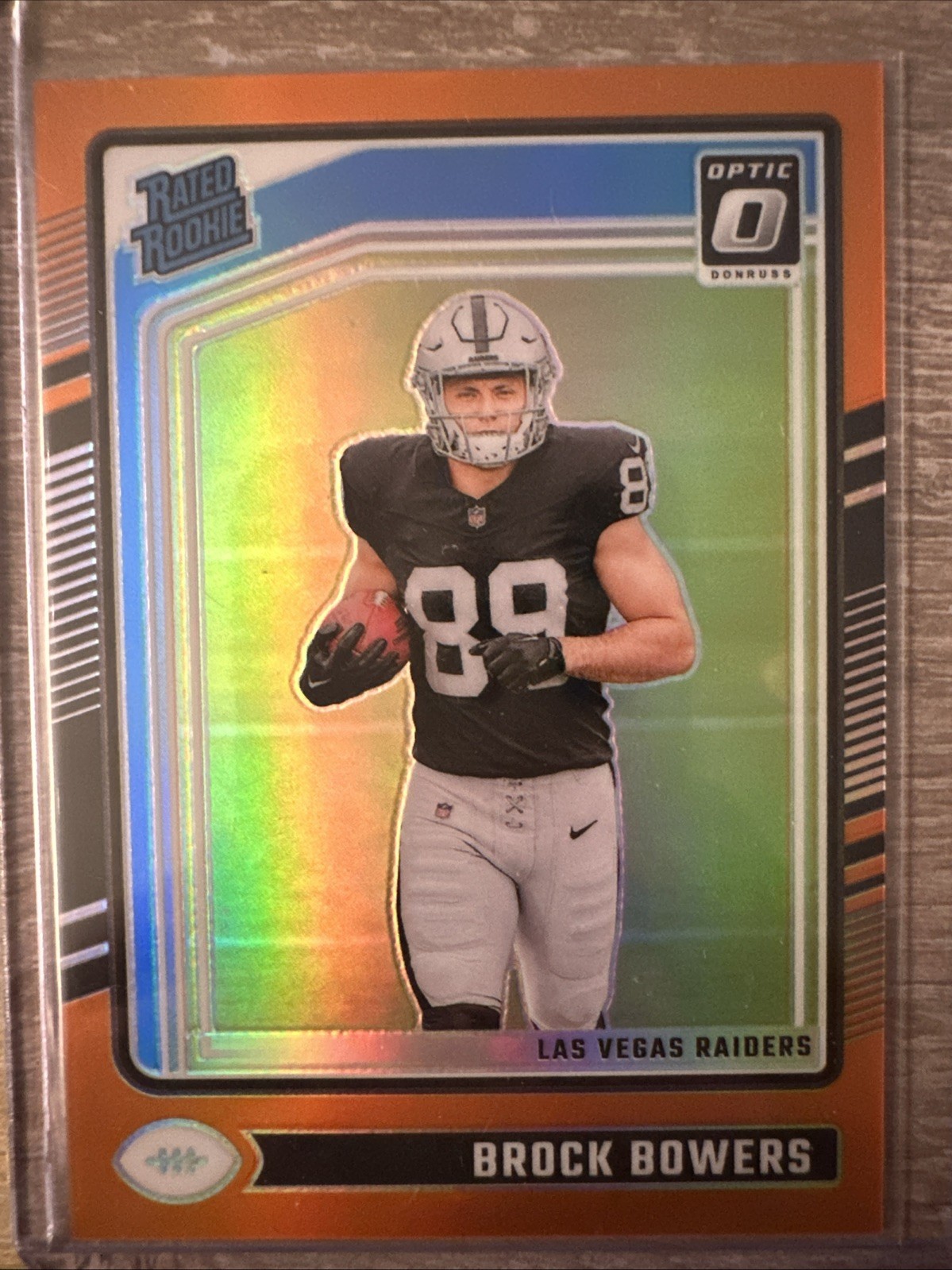 2024 Panini Donruss Optic Rated Rookie Brock Bowers #215 Orange Prizm /249 (RC)