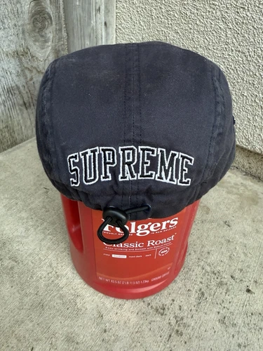 Chapeau Supreme 5 panneaux cordon choc bleu marine bon état made in USA