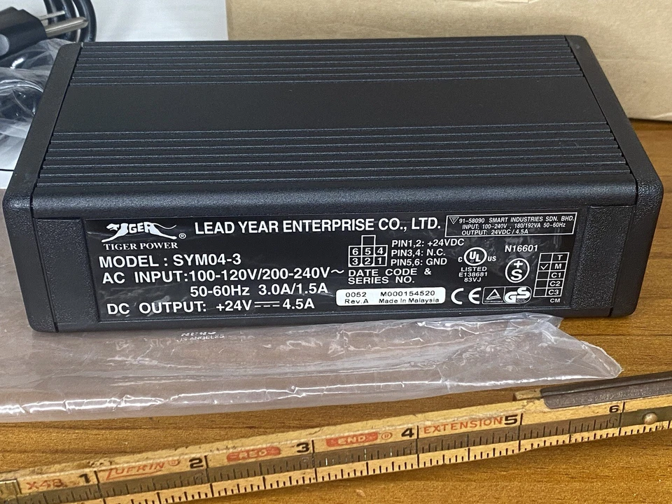 Fuente de alimentación Tiger Power Lead año 24V 4.5A CC SYM04-3 con cables y manual Foto 2 de 4