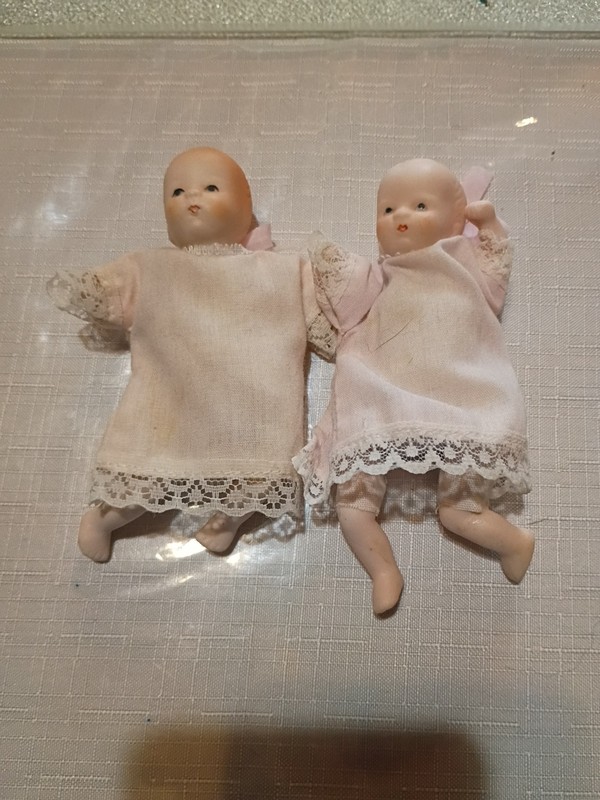 Vintage Russ Berrie and Co  4-1/2" Porcelain Baby Doll with Dress Moveable Arms