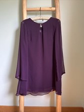 Wyatt Keyhole a-line dress.  100% polyester with lining.