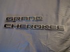 USED OEM 2017 - 2022 Jeep Grand Cherokee Emblem Front Door Black Chrome