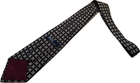 Black silk tie with white geometric diamond pattern, hand made in USA, displayed against a burgundy neck.