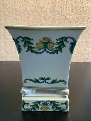 A large Chinese porcelain square vase painted with flowers and 4 foo dogs