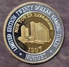 1997 john ascuaga's nugget NEW TOWER EXPANSION CASINO TOKEN Outter SILVER RIM
