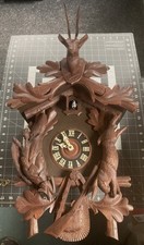 Antico orologio a cucù in legno intagliato made in Germania pistola cervo motivo coniglio cacciatore