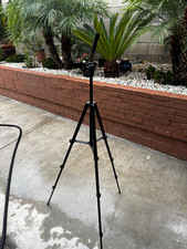 Tripod compatible with phones/cameras. Bluetooh control for pictures included