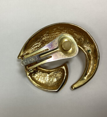 Clips d'oreilles vintage YVES SAINT LAURENT strass et métal doré à l'or