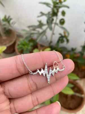0.50 Ct Round Cut Real Moissanite Heartbeat Pendant 14k White Gold Plated Silver