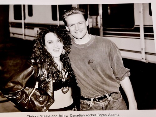 Bryan Adam's & Chrissy Steele Candid Photo by Hugo Dixon - Picture 2 of 3