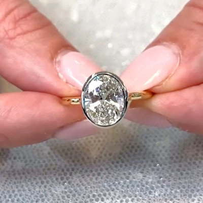 3.85Ctw Oval Moissanite Bezel Hidden Halo Engagement Ring In 14K Two-Tone Gold