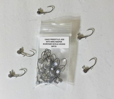 25 Hand made 1/24oz w/ keeper freestyle jig heads with a #4 bronze sickle hooks