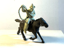 Marx 1950's 60mm plastic Chubby Cowboy with lasso on gray galloping horse.