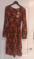 Stunning long sleeved Joe Brown Dress 8. Zip up with pleated skirt and tie back.