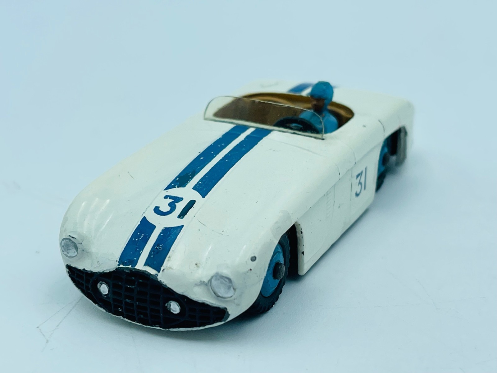 Five Dinky Toys sports racing cars, comprising a No. 133 Cunningham C-SR, a No