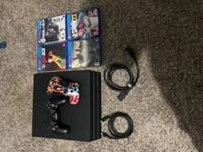 Sony PlayStation 4 Pro 1TB Console - Black with games and extra controller