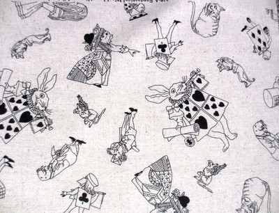 V&A Alice in Wonderland Black and Natural  Cotton Linen Canvas Fabric BTHY