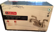 DELTA 2-HANDLE CENTERSET BATHROOM FAUCET. 567-961. BRUSHED NICKEL