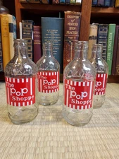 Four POP Shoppe Bottles 