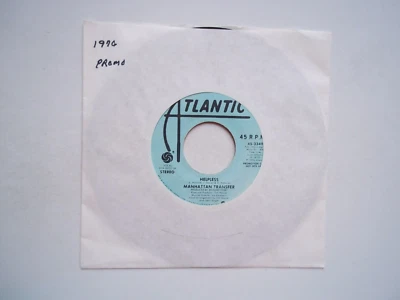 MANHATTAN TRANSFER - Helpless (Stereo) / (Mono) - PROMO 45 RPM 7" Record 1976 - image 1 of 4