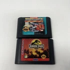 Jurassic Park & street fighter II special champion edition swag genesis games