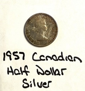 1957 Canada Half Dollar Coin - Silver -  scratched.  Canadian 50C