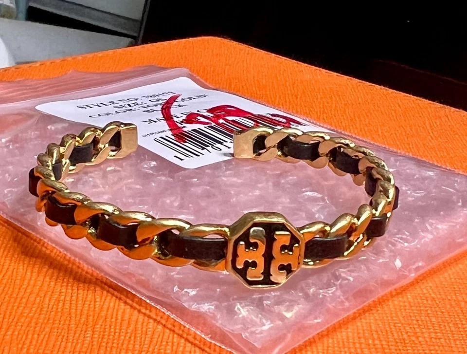 Pulsera Tory Burch Marion Tejida Oro y Cuero Negro Foto 4 de 4