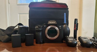 Sony Alpha A7II with 28-70mm Lens and Cage, 2 Batteries, Bag, And Accessories.