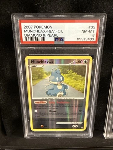 2007 Pokemon Diamond & Pearl Munchlax Reverse Holo #33/130 PSA 8