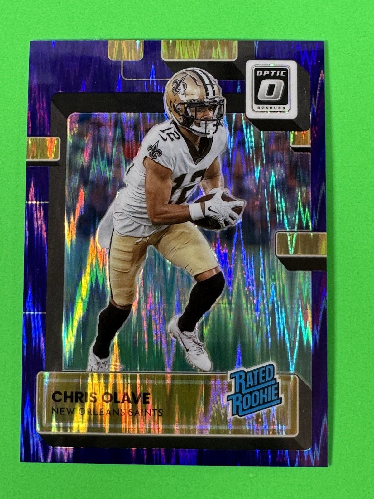 Chris Olave 2022 Donruss Optic Purple Shock PRIZM RC No. 209 Saints