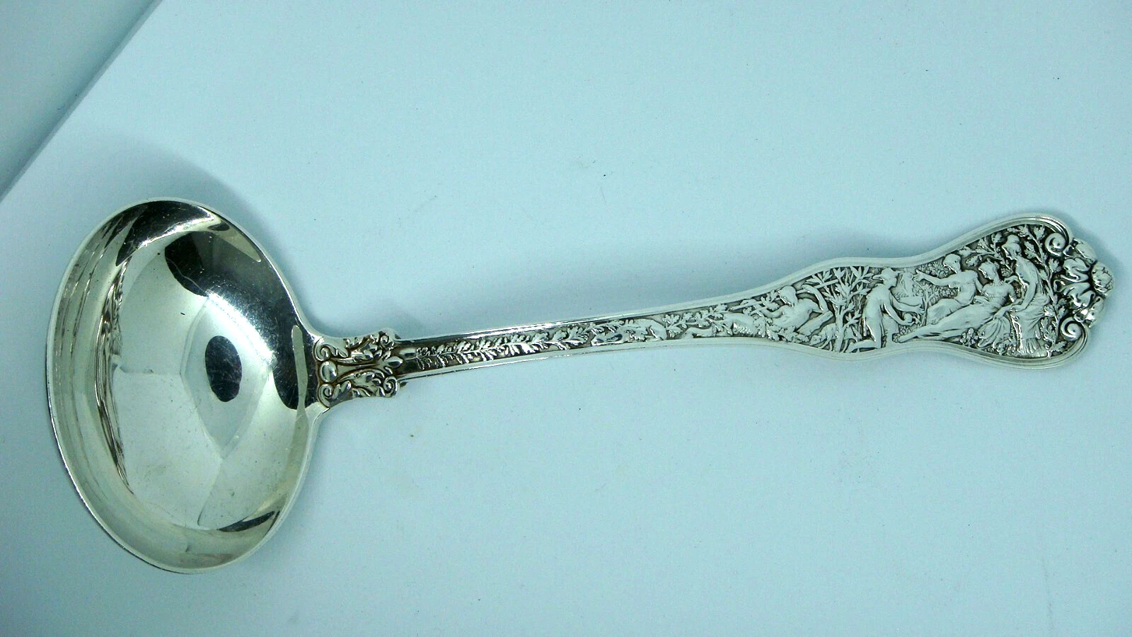 TIFFANY & CO "OLYMPIAN" PARIS, THE SON OF PRIAM STERLING GRAVY LADLE, C.1878 4.1
