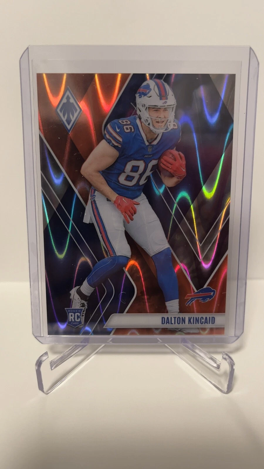 2023 Panini Phoenix Rookies Orange Seismic /99 Dalton Kincaid #114 Rookie RC