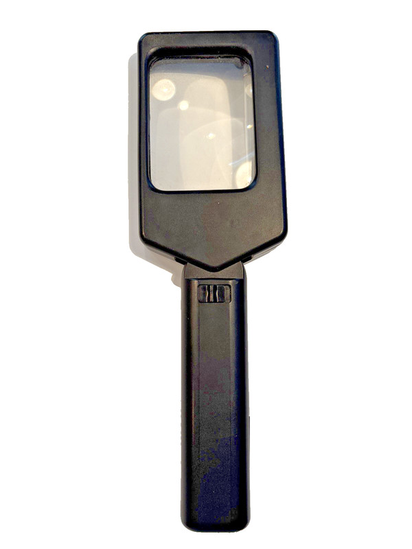 Magnifying Glass with Folding Handle.