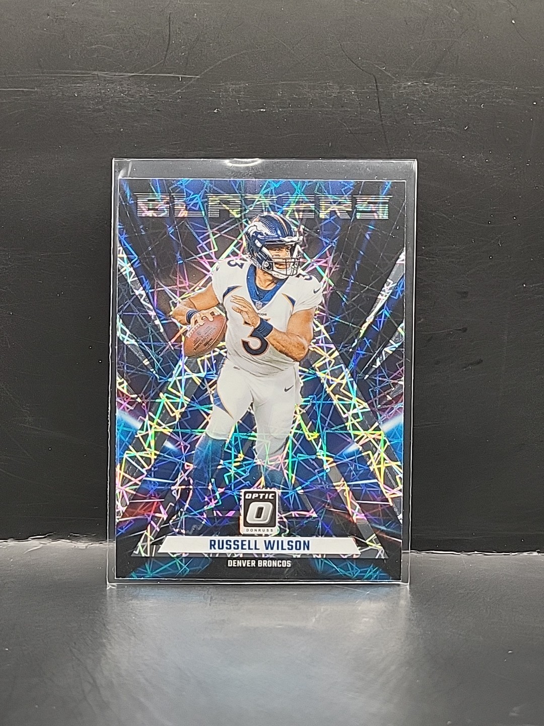 2023 Donruss Optic Russell Wilson Blazers #4 SSP Case Hit Broncos