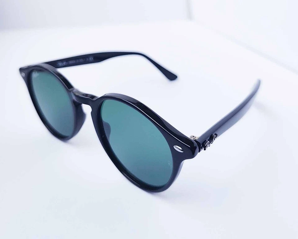Очки солнцезащитные Ray-Ban RB2180 полированная черная оправа темно-зеленые линзы 49 мм унисекс - Изображение 3 из 4