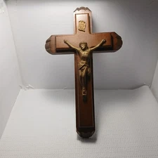 Vinatge Last Rites wooden crucifix, a Christian religious item.