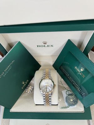 Rolex Datejust 31mm SS/18K Yellow gold Jubilee bracelet.Silver/diamond dial