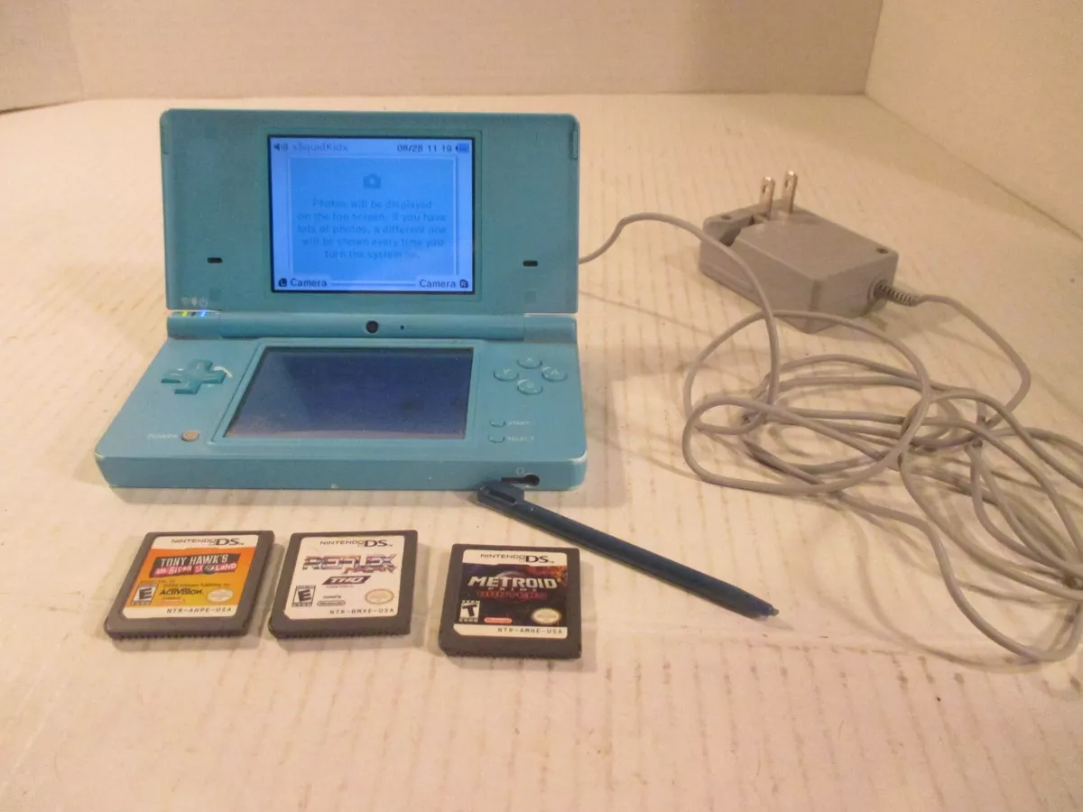 Nintendo DSi Light Blue Handheld Console Game System with charger and case