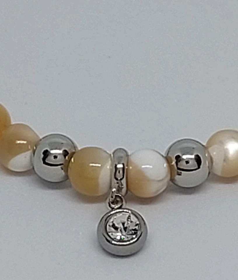 Modeschmuck Muschelkernperlen Armband Trochus Muschel  6 mm Perlen Handarbeit  - Bild 2 von 4