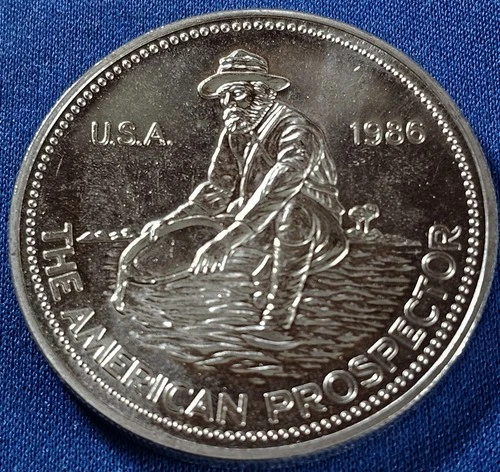 A 1986 Engelhard American Prospector 1oz .999 Fine Silver Round BU
