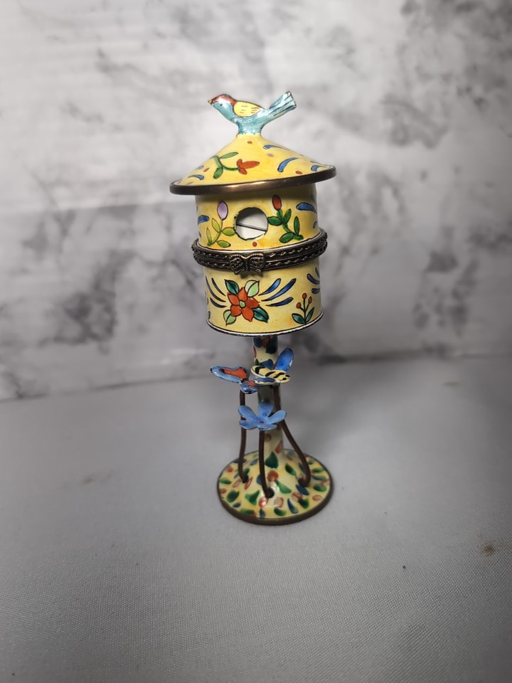Kelvin Chen is a legit collectible enamelware brand — this 1999 yellow birdhouse trinket box is the kind of charming, artisan desk piece that delights at first glance.