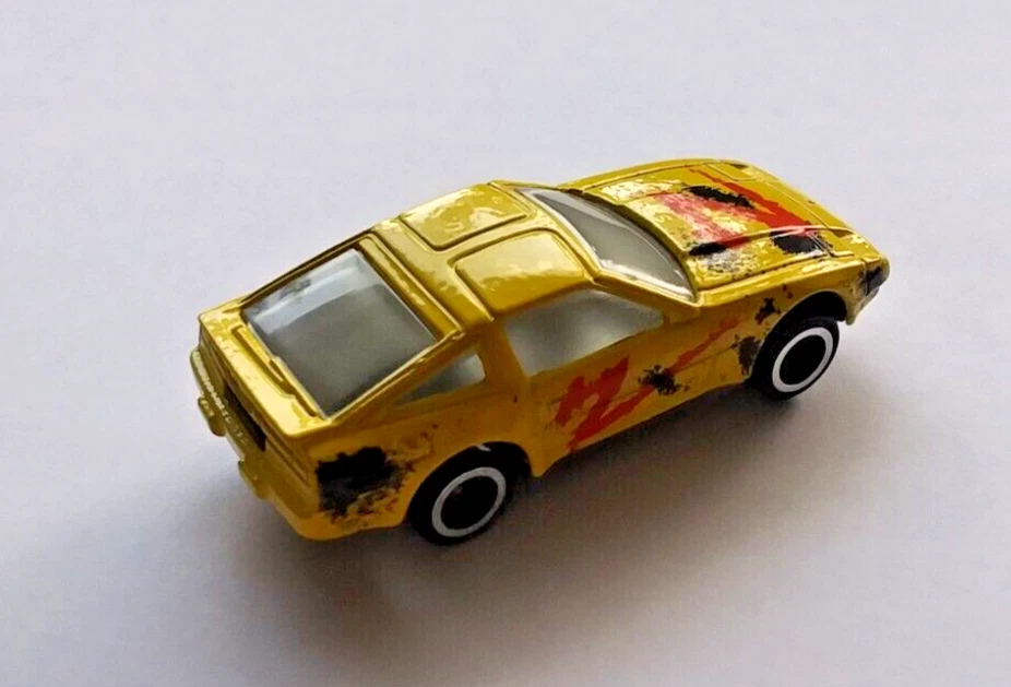 Tiras de metal fundido a presión ERTL Nissan 300ZX Z31 1/64 velocidades, nunca jugadas. Foto 2 de 4