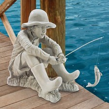 boy fishing figurine