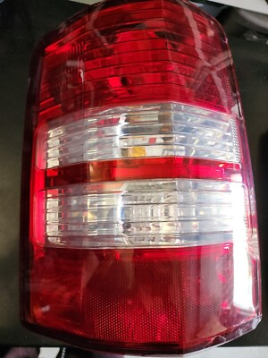 OMIX 12403.13 Driver Side Tail Light In Black For 91-97 Jeep Wrangler YJ &amp; TJ Qu