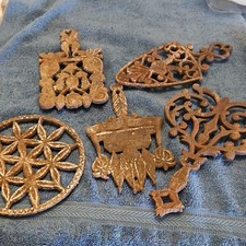 antique Cast Iron Trivet Set Rustic Ornate Designs Lot of 5 Varied Shapes