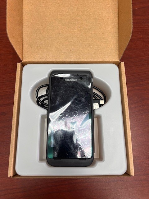 Honeywell CT45 XP handheld computer with battery, spare battery and USB cable
