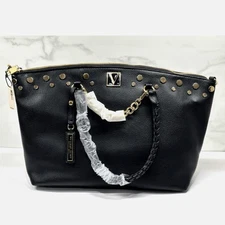 Victoria’s Secret black and gold Studded Handbag.